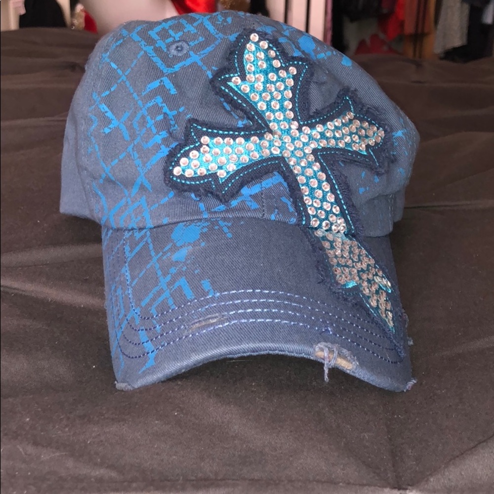Blue bedazzled cross hat
